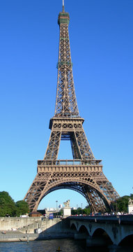 Landmark image of Eiffel Tower from the river Seine in Paris, France