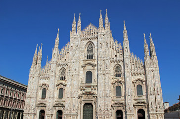 Fototapeta na wymiar Duomo di Milano in Italy, with blue sky.