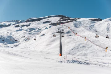 Fotobehang Ski lifts durings bright winter day © Elnur