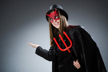 Funny devil in halloween concept