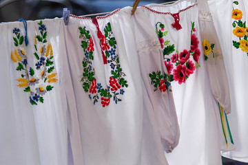 Embroideries on the clothesline. Ukrainian folk costumes
