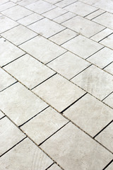 A gray concrete pavement texture.