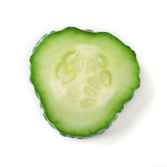 Slice of ripe cucumber isolated on white