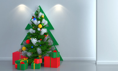 Christmas tree with gifts on white wall background.