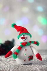 Cute snowman on Christmas background
