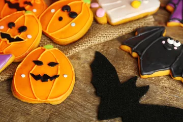 Foto op Plexiglas Creative cookies for Halloween party on wooden table, close up © Africa Studio