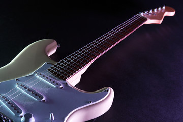 Obraz premium Electric guitar, on dark lighted background