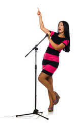Woman singing in karaoke club on white
