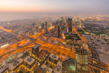 Obraz na płótnie Canvas Panorama of night Dubai during sunset