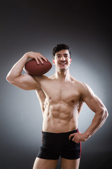 Muscular man with american football