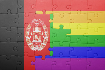puzzle with the national flag of afghanistan and gay flag