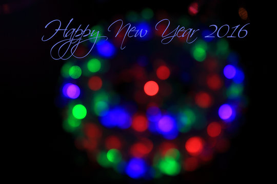 Bokeh lights background with word "Happy New Year 2016"