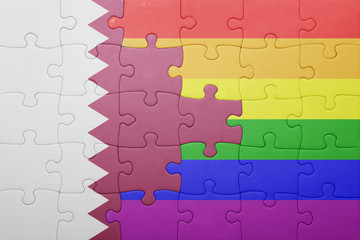 puzzle with the national flag of qatar and gay flag