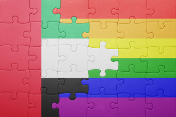 puzzle with the national flag of united arab emirates and gay flag