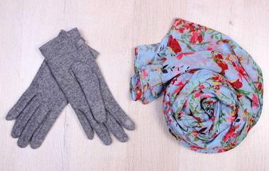 Womanly clothes on wooden background, clothing for autumn or winter