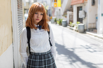Fototapeta na wymiar Japanese school girl