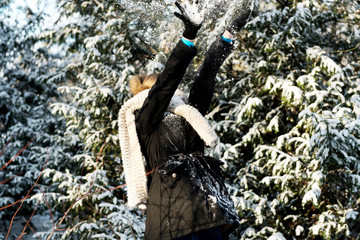 Woman is defending herself playing snowball fight