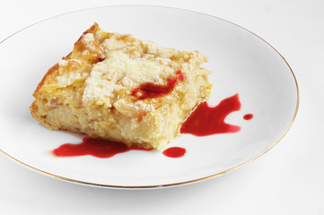Piece of an apple pie with jam