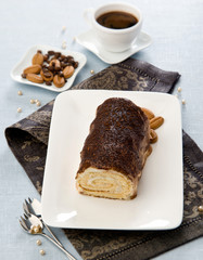 Chocolate swiss roll in festive decoration