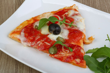 Pizza with salami and mozzarella