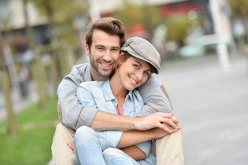 Fototapeta na wymiar Portrait of in love young couple in town