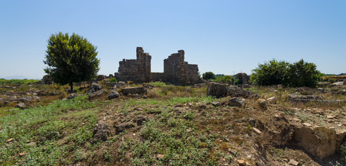Fototapeta na wymiar Ancient ruins of Perge. The ruins of an ancient Roman basilica.Turkey.