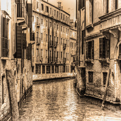 Fototapeta premium narrow canal in Venice in sepia tone