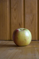 Apple on wooden background