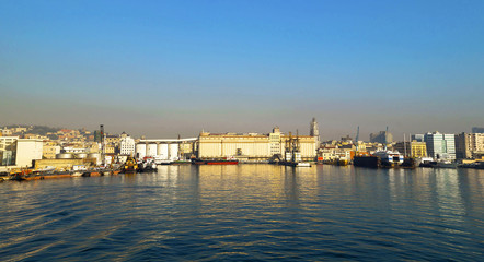 Morning view of harbor of Naples. Pollution and smog alert over the city.