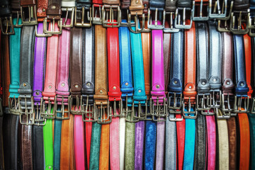 close up of colorful leather belts