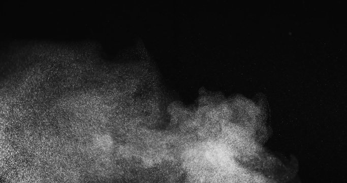 Atmospheric particle billow dust elements shot in studio