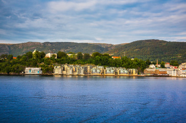 Fototapeta na wymiar Houses on the shore of the Norwegian Sea , Bergen , Norway