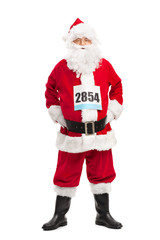 Senior man in Santa costume with a race number