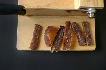 Biltong dried meat with slicer