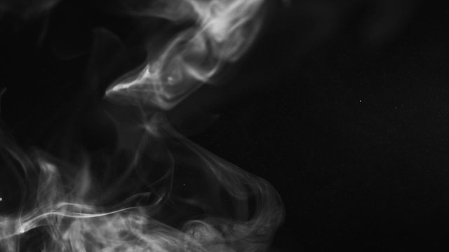 Hot veiny smoke creating thick atmosphere shot in studio