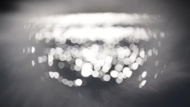 Gorgeous abstract shiny texture with glowing sphere of sparkles on dark blur background. Loopable. Full HD footage 1920x1080
