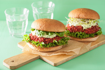 veggie beet and quinoa burger with avocado dressing