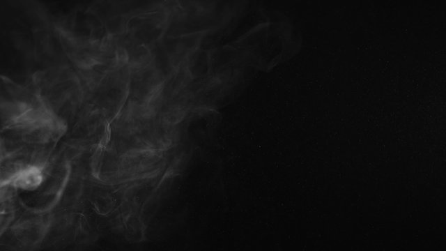 Subtle steamy smoke in thick atmosphere shot in studio