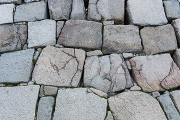 Old rock wall in pattern like jigsaw fashion
