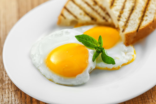 Fried eggs on table