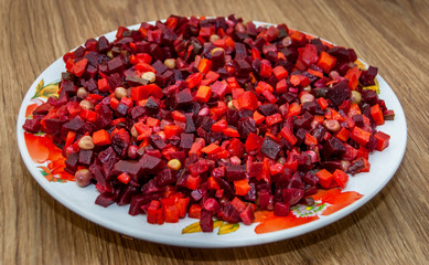 cooked vegetable salad made from chopped on the plate
