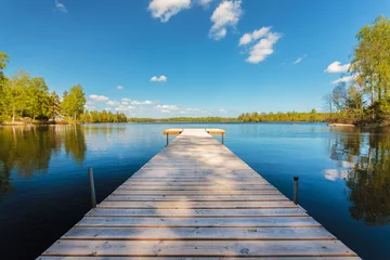 Wooden jetty on a sunny day in Sweden © Martin Bergsma