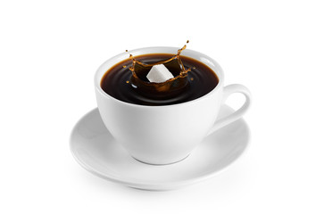 Cup of coffee and sugar on a white background.