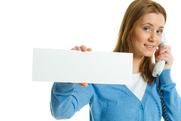 attractive young woman with blank ad banner and telephone
