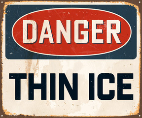 Fototapeta premium Danger Thin Ice - Vintage Metal Sign with realistic rust and used effects. These can be easily removed for a brand new, clean sign.