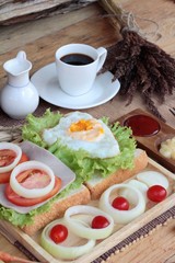 Slice bread ,ham ,fried eggs with breakfast.