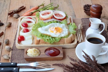 Slice bread ,ham ,fried eggs with breakfast.