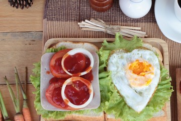 Slice bread ,ham ,fried eggs with breakfast.
