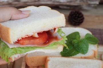 Slice bread ,ham ,fried eggs with breakfast.