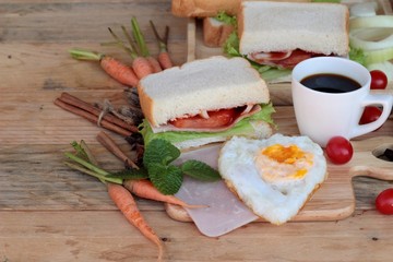 Slice bread ,ham ,fried eggs with breakfast.